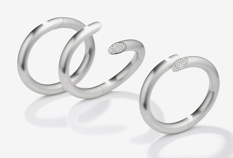 <em>Janus</em> bangles. 950 platinum, diamonds