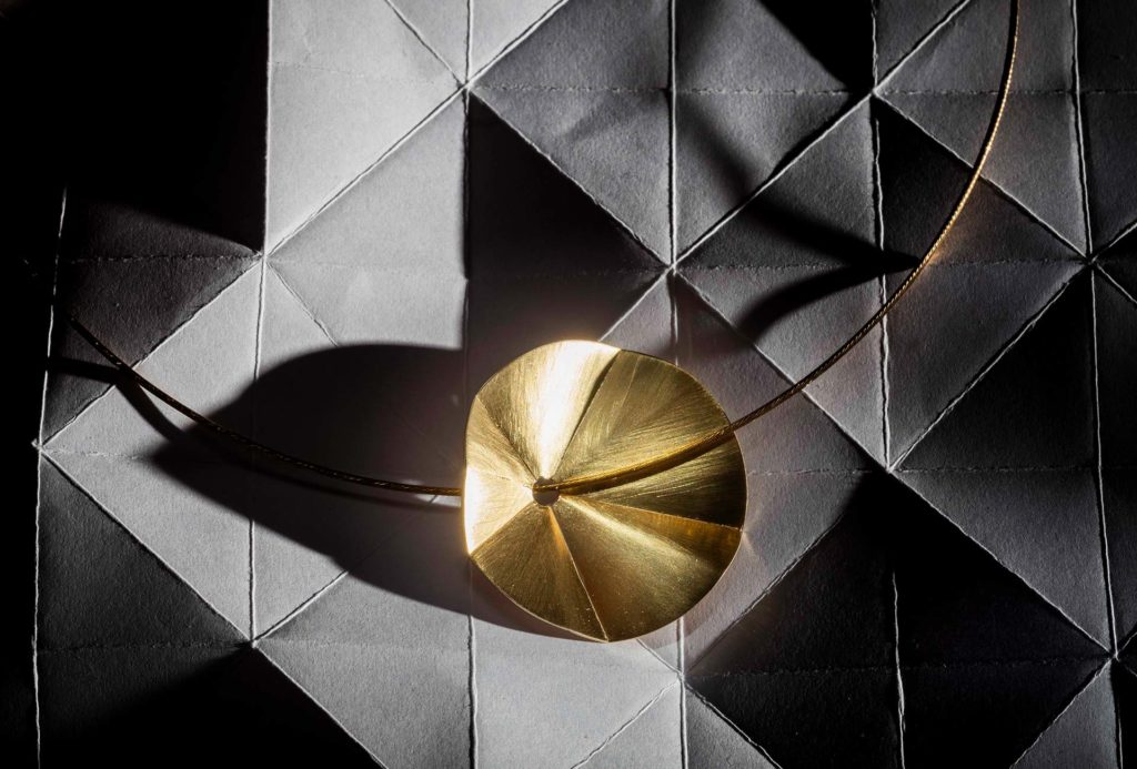 <em>folded</em> necklace. Gold.