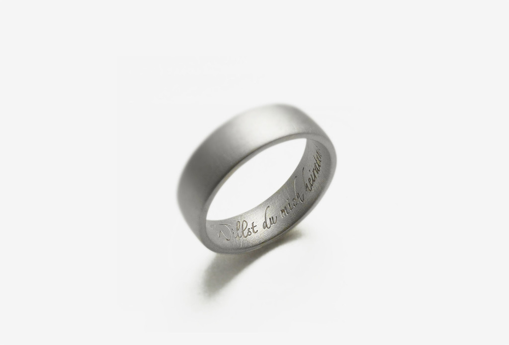 <em>Willst du...?</em> [Do you want...?] engagement ring.