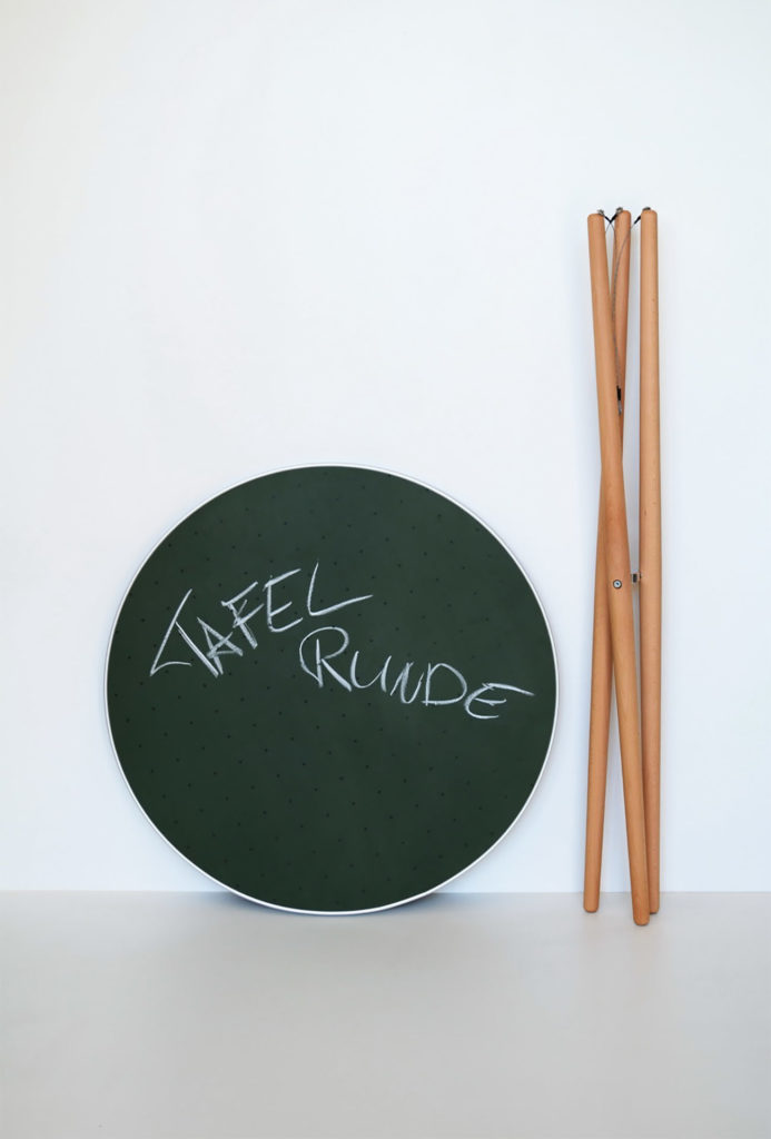 <em>Tafelrunde</em> table. Recycled furniture made of old blackboards