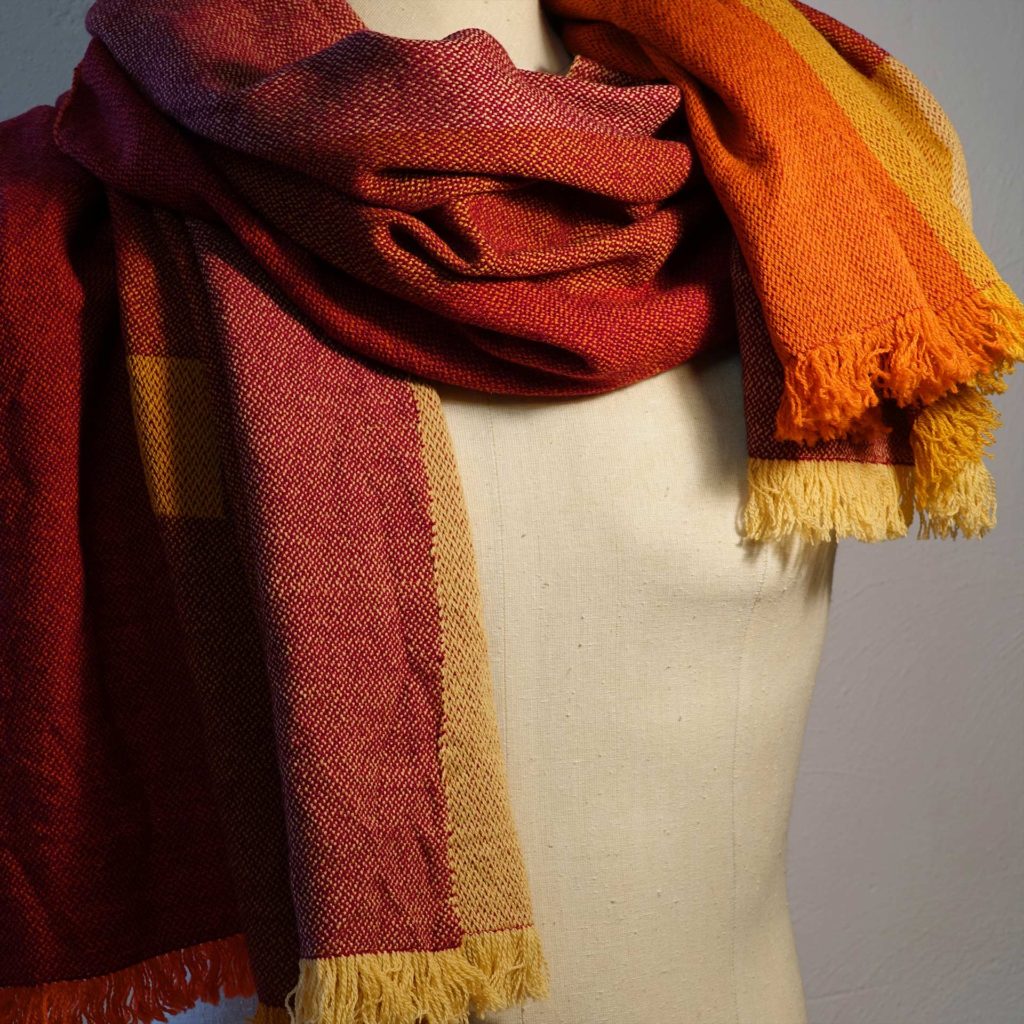 Woolen cloth, orange. Cashmere, wool.